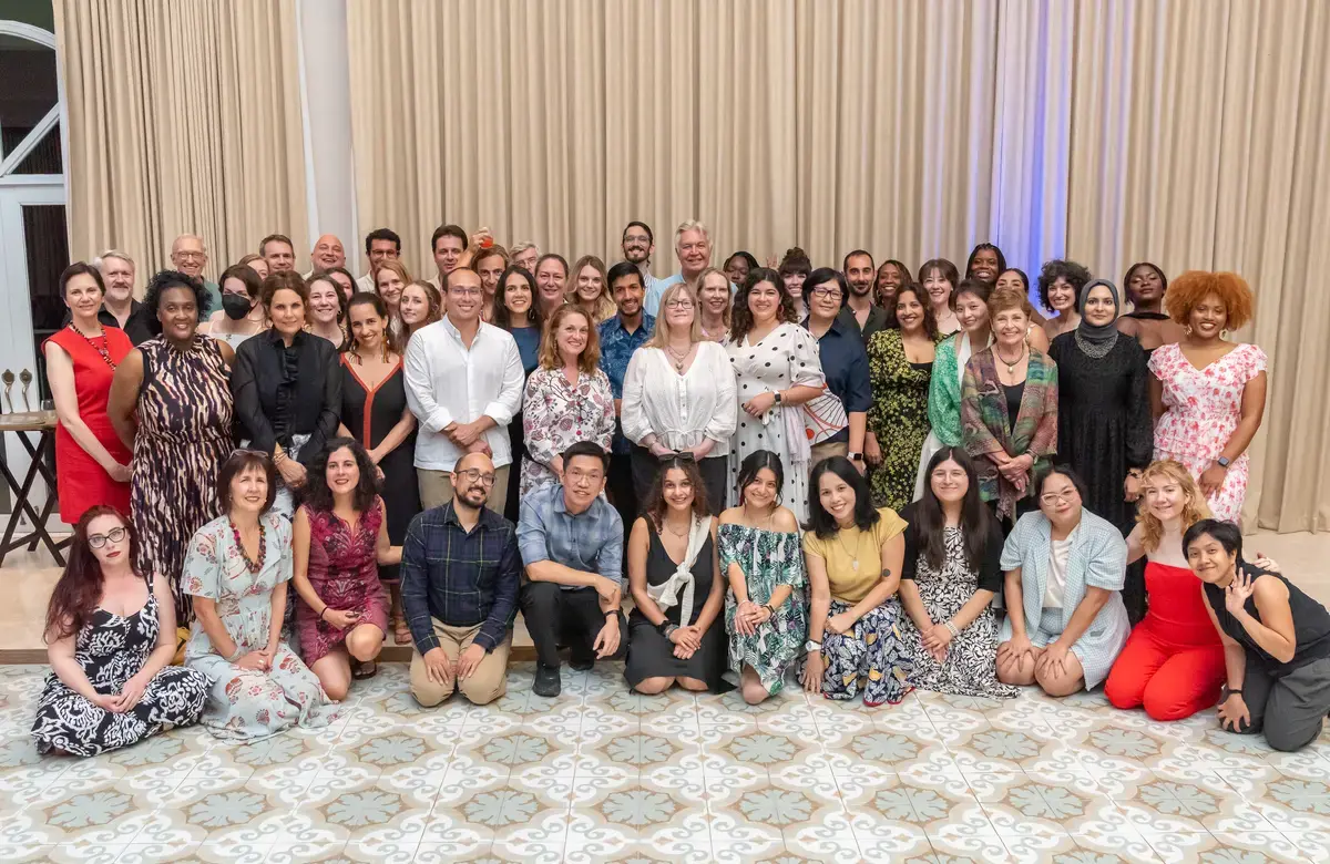 Pulitzer Center staff gather in a group for a photo during a 2024 retreat. 